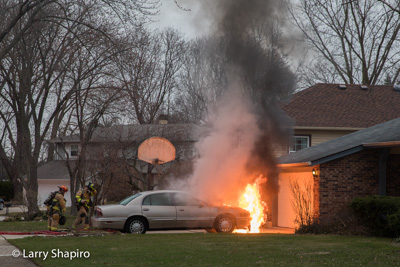 Buffalo Grove Firefighters extinguish a car fire at 999 Harvard Court 3-27-17 Larry Shapiro photographer Shapirophotography.net